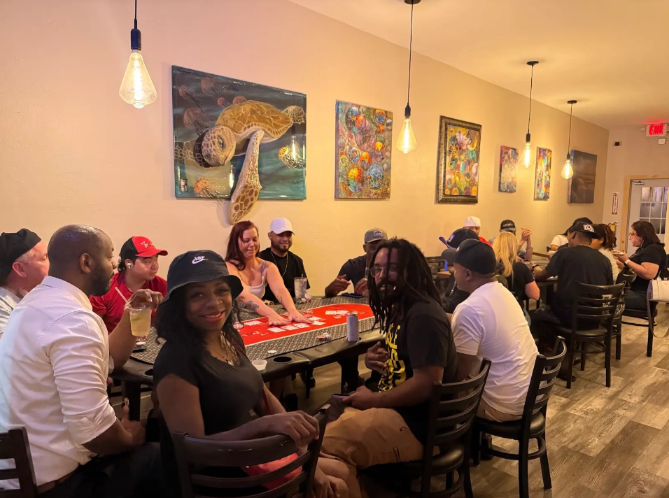 Grandview · Around the table — players at the poker table.